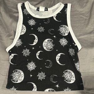 I’m selling this cute sun and moon cropped tank top